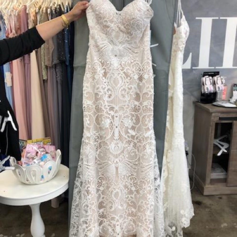 Enchanting Mon Cheri Wedding dress